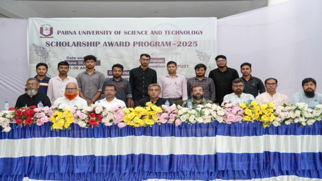 The Vice-Chancellor and guests with scholarship and award recipients. Monday at Pabna Science and Technology University. (Photo: PSTU)