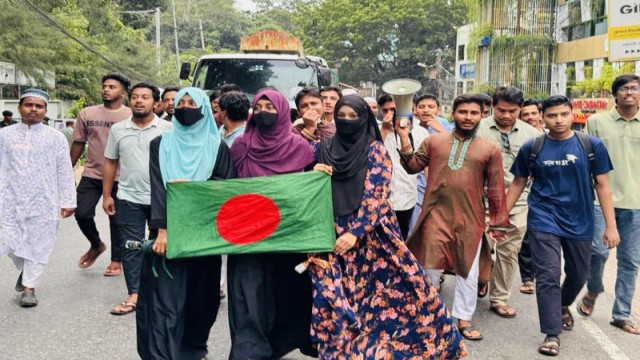 Students and citizens in Rangamati march through Banarupa Bazaar to the Deputy Commissioner’s office, demanding justice and a 'zero tolerance' stance against brutal killings and rising violence.