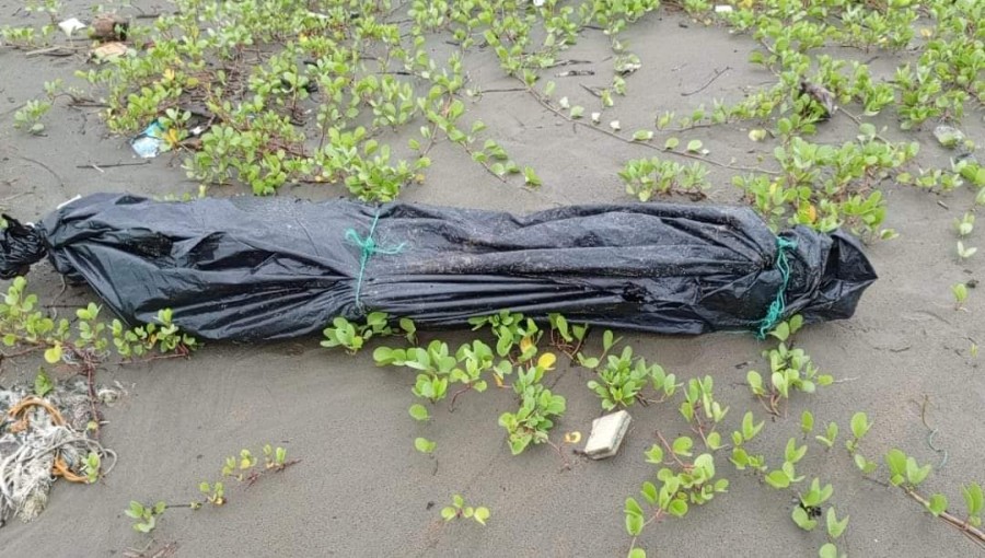 Three bodies found on the shore in Ukhiya following the capsizing of a trawler in the Bay of Bengal. Photo: V7N