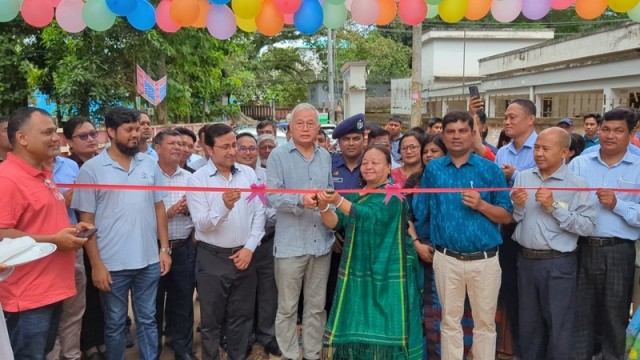 Adviser to the Ministry of Chittagong Hill Tracts Affairs, Supradeep Chakma, inaugurates the newly constructed main gate of the century-old Khagrachhari Government High School on August 23.
