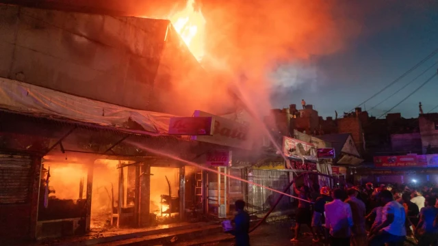 Over 80 shanties and shops destroyed in two separate incidents, highlighting fire safety challenges.