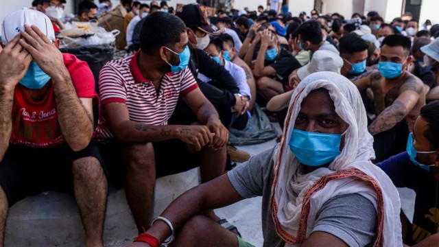 File image: Alleged scam centre workers and victims sit on the ground during a crackdown operation by the Karen Border Guard Force (BGF) Myanmars eastern Myawaddy, on February 26, 2025. Photo: AFP