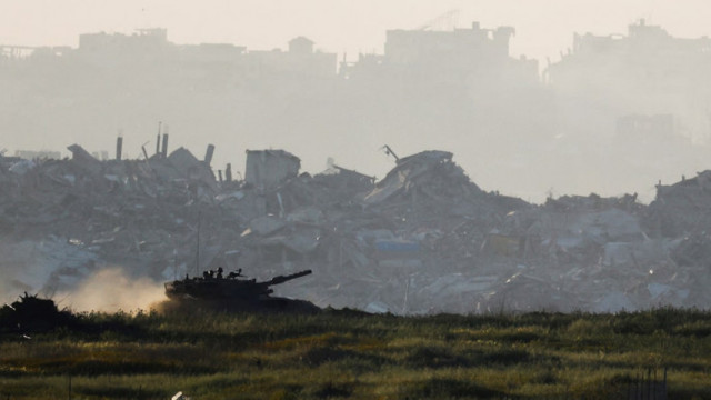 A tank manoeuvres inside Gaza, as seen from Israel's border with Gaza, Israel March 19, 2025. REUTERS/Amir Cohen