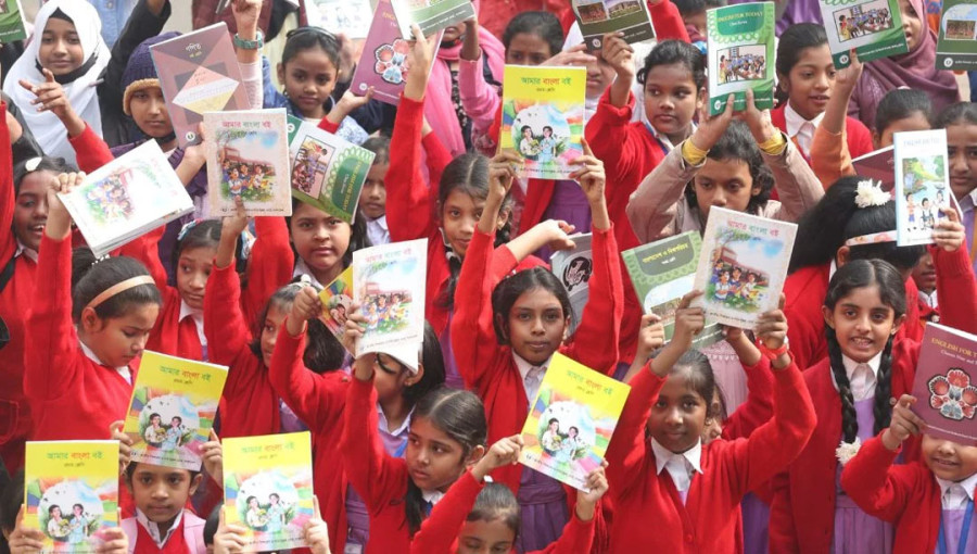 New textbooks being distributed to students at Azimpur Girls' School and College on Wednesday, January 1, 2025.