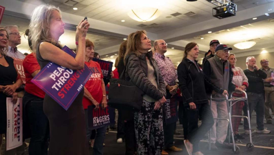 Supporters listen to Republican US Senate candidate Mike Rogers speak at his election watch party with the MIGOP on November 5, 2024 in Novi, Michigan. Photo: AFP