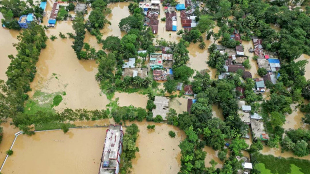 An aerial view shows partially submerged houses after flood in Feni on August 24, 2024. Photo: AFP