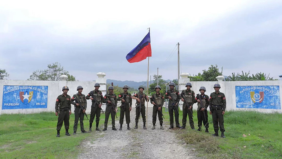 Arakan Army troops pose after seizing a regime Border Guard Police Battalion base, in Maungdaw Township. Photo: Collected