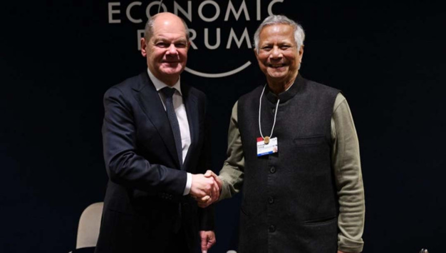 Chief Adviser Muhammad Yunus shakes hand with German Chancellor Olaf Scholz on the sidelines of World Economic Forum Summit in Davos, Switzerland on 21 January 2025. Photo: CA Press Wing