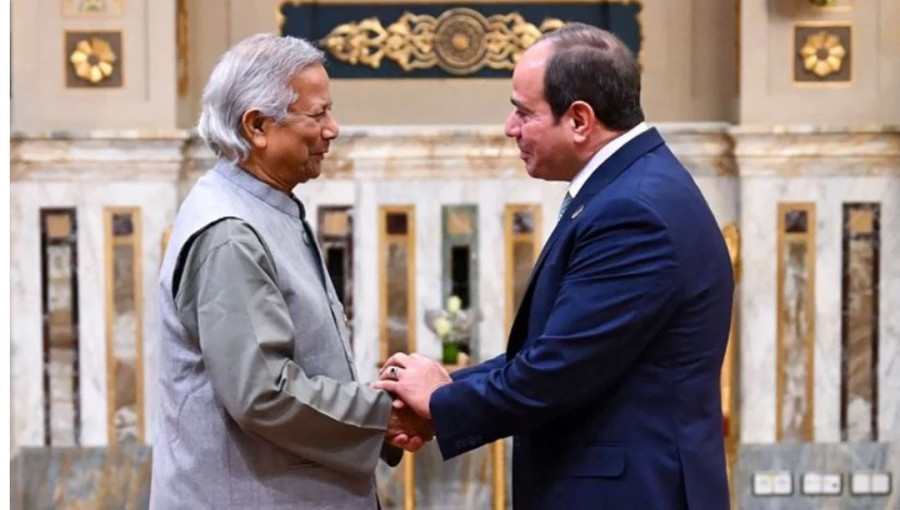 In this handout picture released by the Egyptian presidency's press office, Bangladesh's interim leader Muhammad Yunus is welcomed by Egypt's President Abdel Fattah el-Sisi during the D-8 summit in Cairo, on December 19, 2024. Photo: AFP