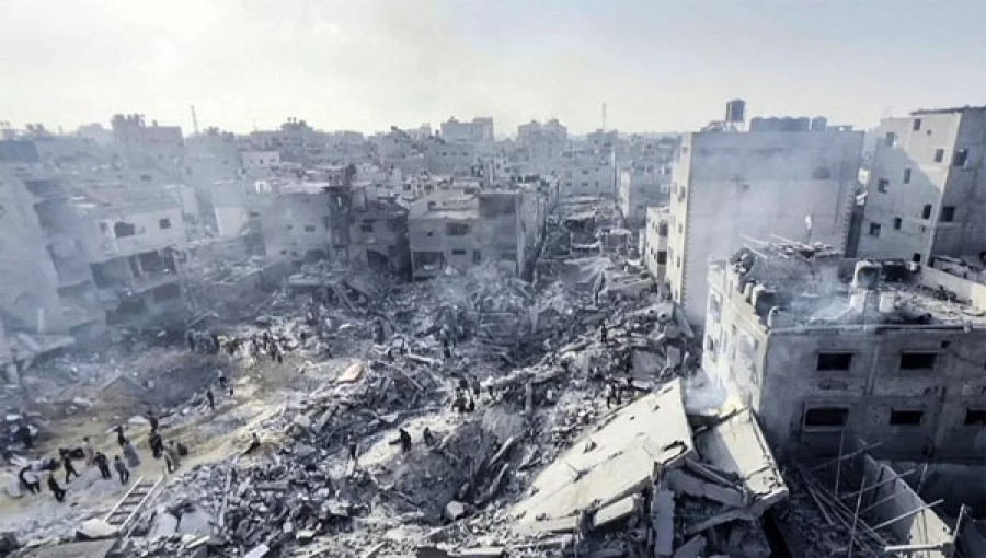 Palestinians checking the destruction in the aftermath of an Israeli strike on the Jabalia refugee camp in the Gaza Strip.