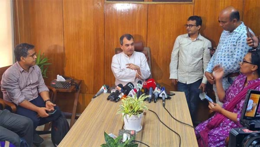 Environment Minister Saber Hossain Chowdhury talks to reporters at his Secretariat office on Thursday.
