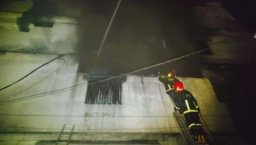 Members of the Fire Service and Civil Defence trying to douse the blaze that broke out at the chemical warehouse of a shoe factory in Dhaka's Chawkbazar on Saturday