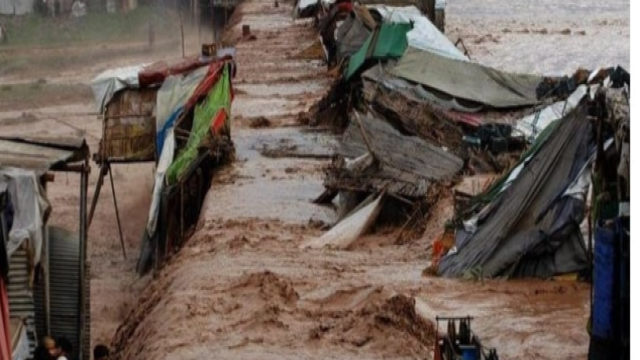 Rescue workers search for survivors in debris following landslides in northwest Pakistan