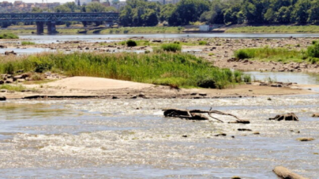 Warsaw’s iconic river drops to just 18 centimeters, surpassing last year’s record, as climate change and heatwaves drive a deepening water crisis.