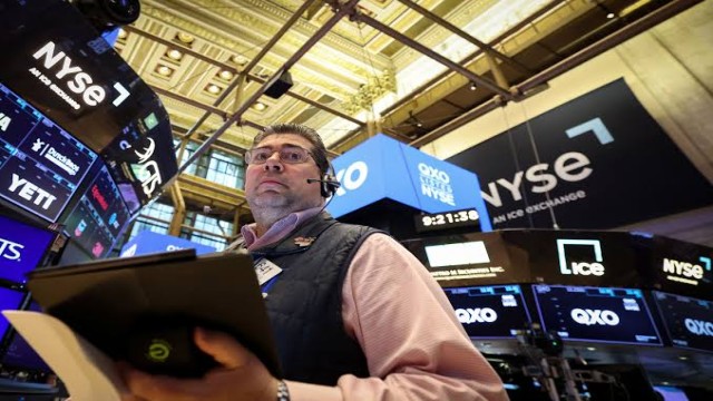 Tech giants fuel market rally with better-than-expected results; S&P 500 nears record high.