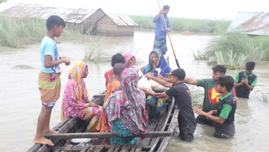 "Mr. Mehedi Hasan Durjoy of Universal Emiti Foundation oversees relief distribution to flood-affected families in Chilmari, Kurigram."