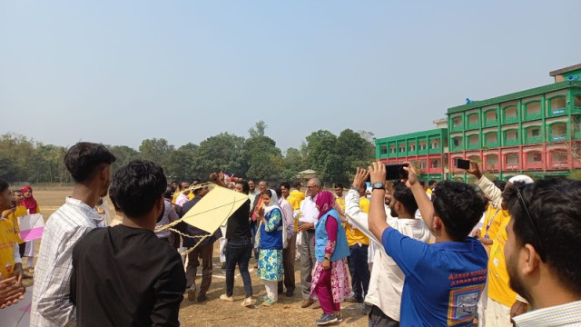 Students flying kites during the vibrant Kite Festival at Ukhiya College, organized by the International Organization for Migration (IOM), to celebrate Bangladeshi culture and traditions.