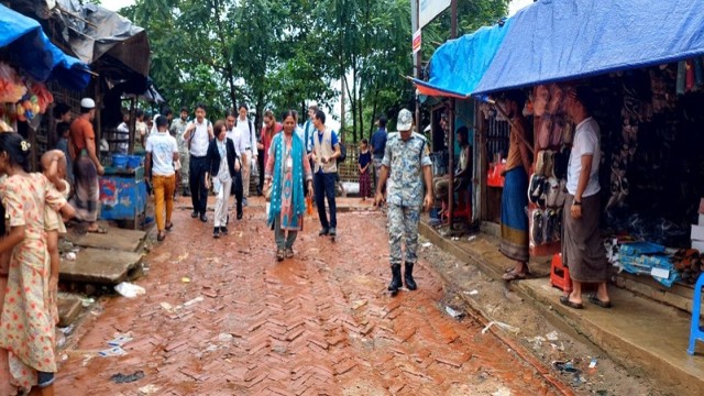 A senior member of JICA’s high-level delegation is seen entering Camp 4 Extension in Ukhiya during their official inspection visit. Photo: V7N