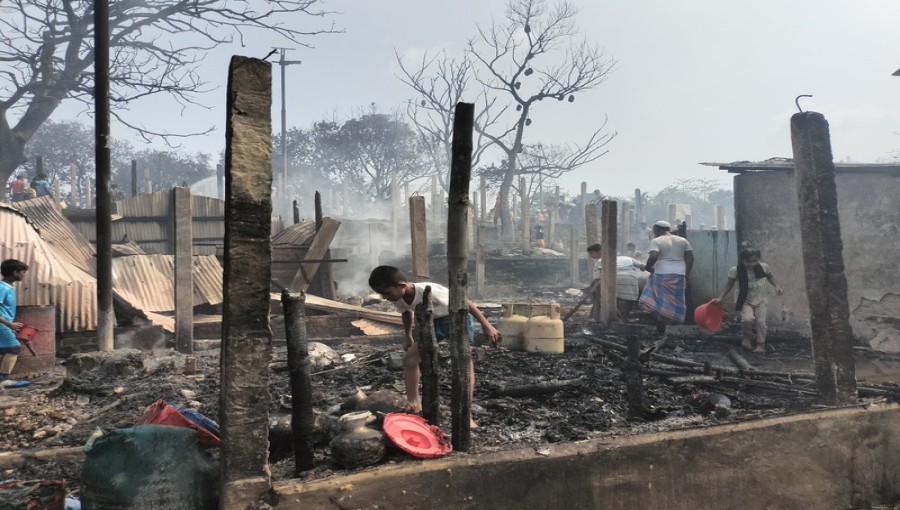 Devastating aftermath: Residents survey the damage after fire engulfs Rohingya camp, destroying 100 homes in Ukhiya, Cox's Bazar. Photo: Voice& News