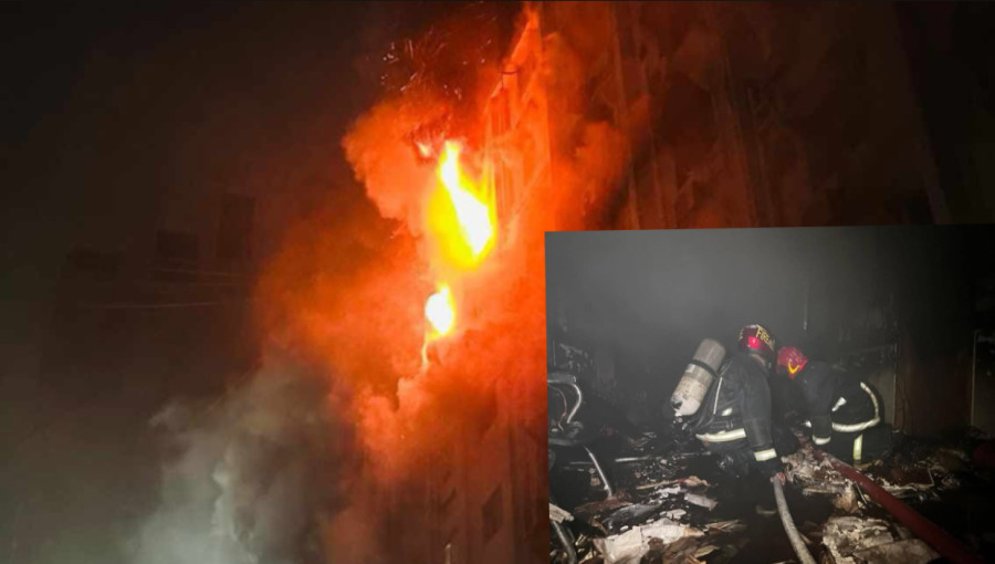 Firefighters battling a massive blaze at Building 7 of the Bangladesh Secretariat, with smoke engulfing multiple floors.