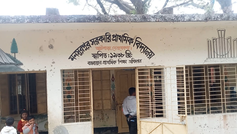 "Allegations Surface: Md. Saiful Islam, headteacher of Mansurpur Government Primary School in Netrakona, faces accusations of extortion and unethical practices, sparking outrage among local business owners and residents."