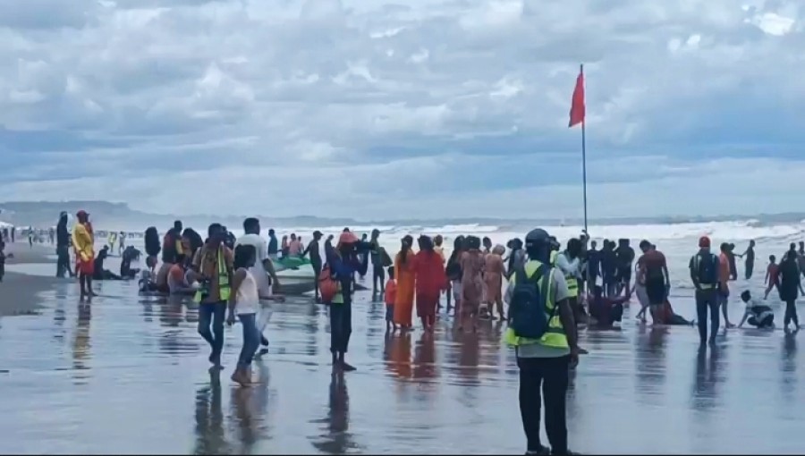 "Cyclone 'Remal' attracts curious onlookers to Cox's Bazar beach, where intense waves and gusty winds create a captivating yet perilous spectacle." Photo: Voice7 News