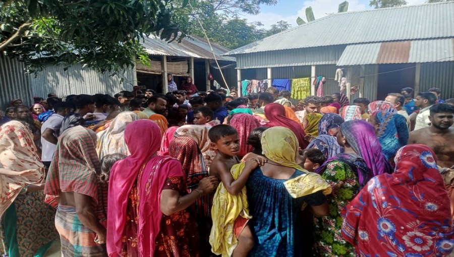 Mourners gather near the river where three children tragically drowned in Pabna.
