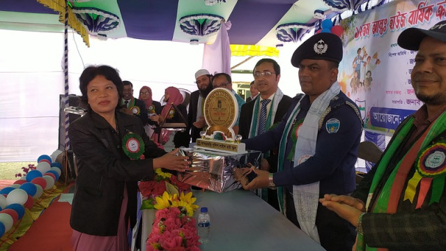 "Khagrachari Police Lines High School’s Annual Sports Award Ceremony in full swing, with winners receiving their prizes from the chief guest."