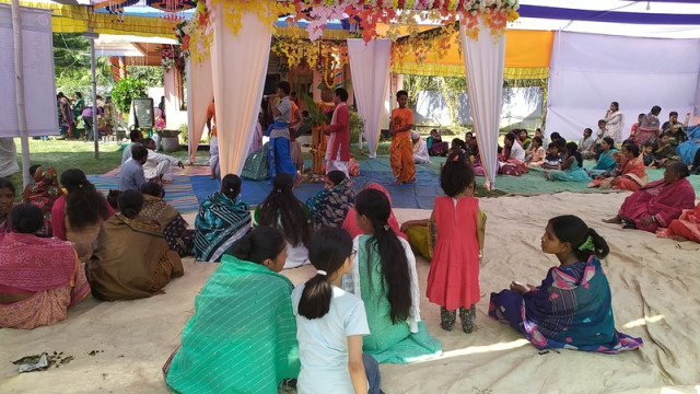 "Devotees participate in the grand Shiv Chaturdashi celebrations at the Central Crematorium in Khagrachhari."