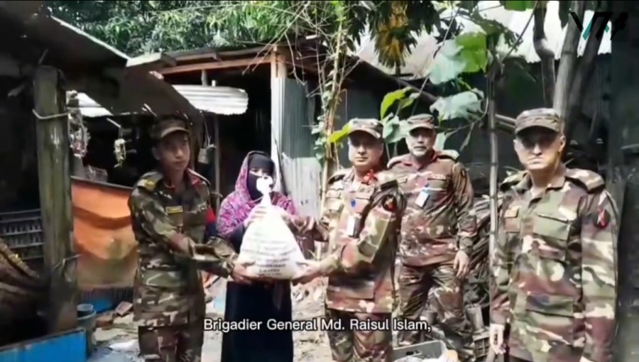 Brigadier General Md. Raisul Islam, Commander of the Guimara Region, distributing food supplies to flood-affected families in Khagrachari.