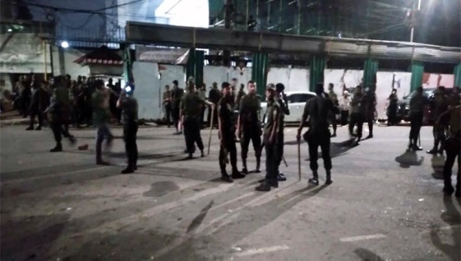 Dhaka University students face off against Ansar members during a heated clash near the Secretariat.