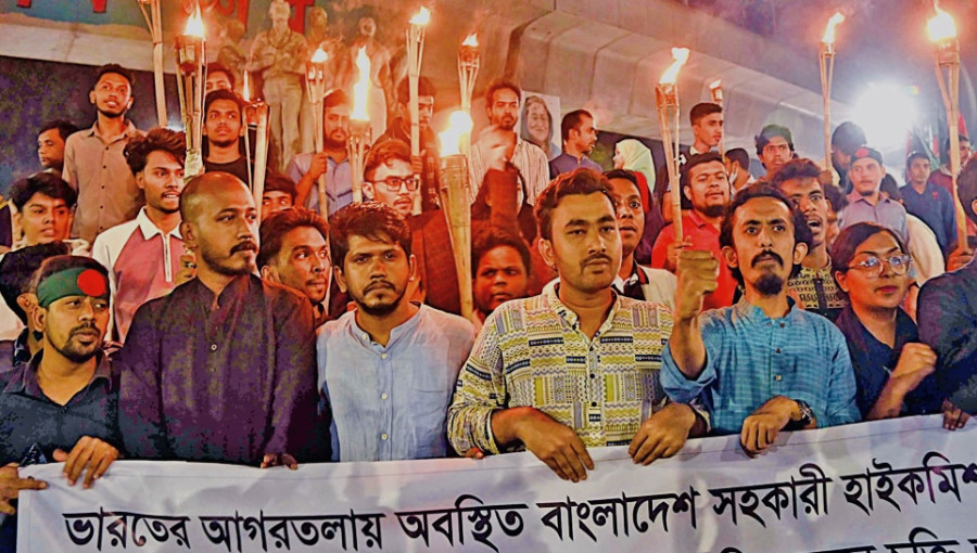 "Voices of Unity: Protesters in Dhaka rally against the attack on Bangladesh's Agartala Mission, calling for justice and national solidarity amidst rising tensions."