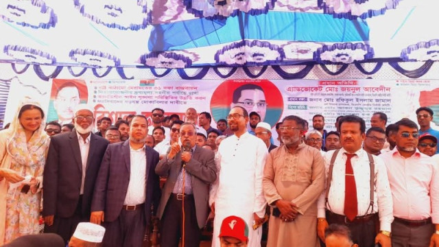 BNP Vice President Advocate Md. Zainul Abedin addresses a public gathering at Jhalakathi Government Boys' High School ground, urging the government to prioritize national elections over local polls.