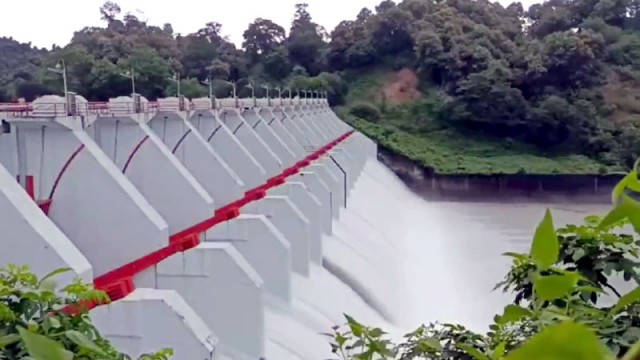 Photo shows the 16 gates of Kaptai Dam fully opened to release approximately 68,000 cusecs of water from the reservoir into the Karnaphuli River amid rising water levels caused by continuous heavy rainfall.
