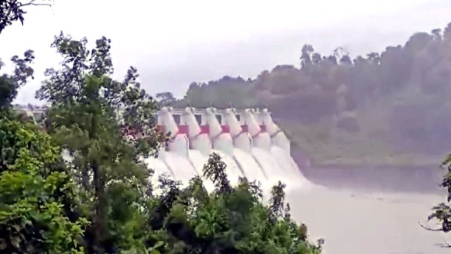 "Water rushes through 16 opened spillway gates of the Kaptai Dam after rising lake levels triggered an emergency release — Karnafuli River, Rangamati, August 5, 2025. (V7N Photo)"