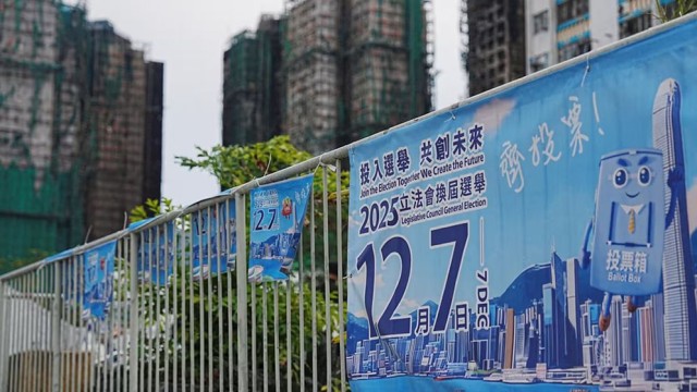 Hong Kong Holds Local Elections Amid Mourning Deadly Fire