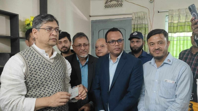 BNP Leader Salahuddin Ahmed receiving his National ID card at the Pekua Upazila Election Office, after a 9-year delay.