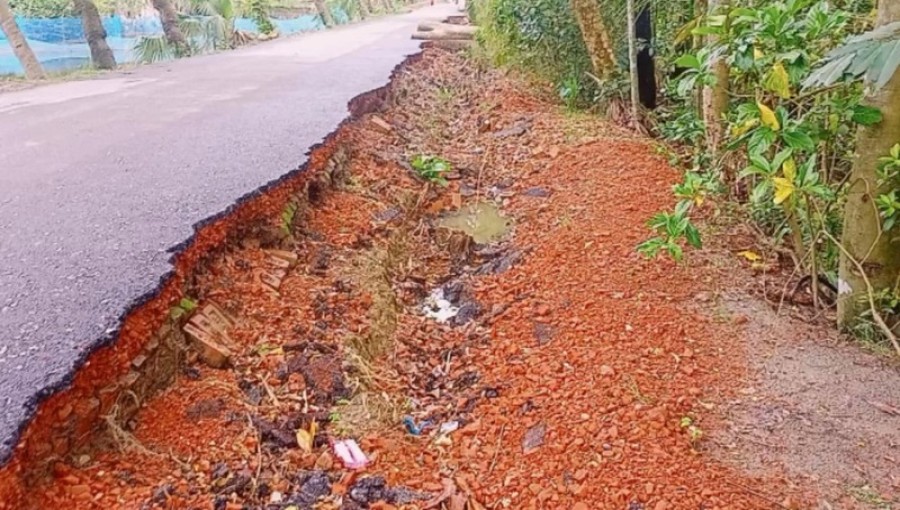 "Severely damaged roads in Barguna's six upazilas, like this 16-kilometer stretch of the Lakurtola-Fuljuri via Bawalkor road, have become dangerous for daily commuters.  Photo: V7N