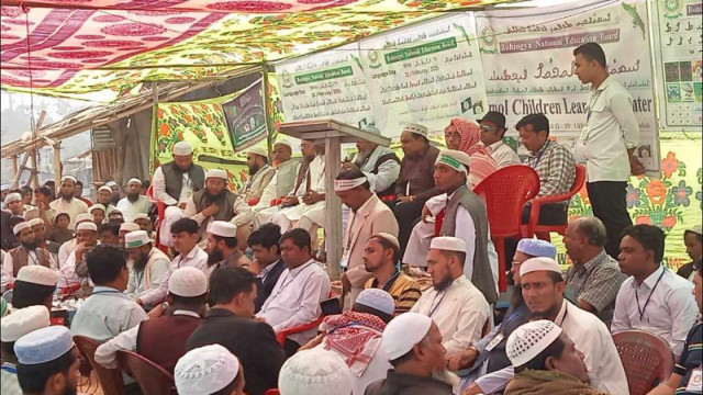 "Rohingya refugees in Ukhiya commemorate International Mother Language Day, honoring their linguistic heritage and expressing a desire to return to Arakan."