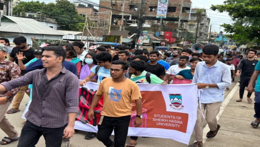 "Students of Sheikh Hasina University in Netrokona march through the town, demanding the abolition of the quota system."