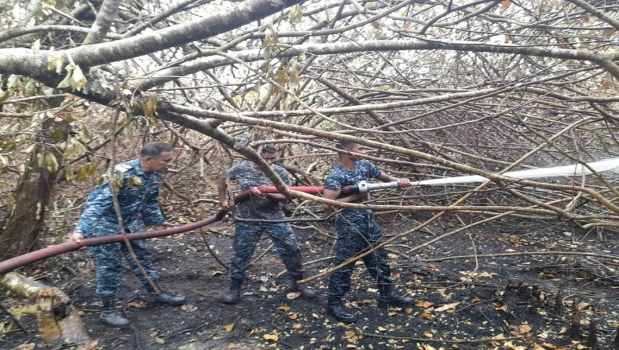 First to arrive at the Mongla base of the naval force was a ten-man firefighting unit.