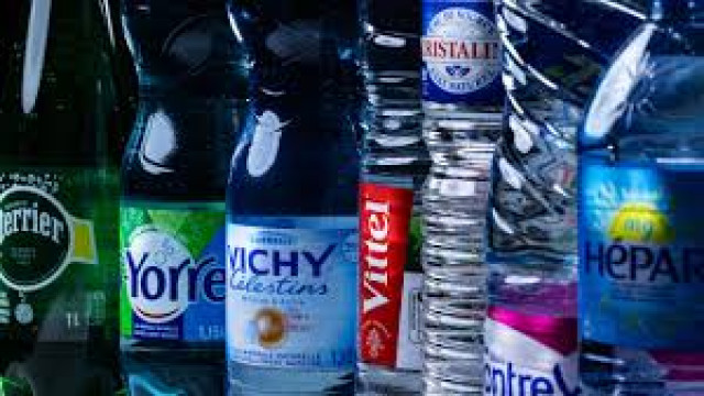 Bottled mineral water brands under Nestlé Waters and Sources Alma are seen on supermarket shelves in Paris, amid a growing fraud investigation.