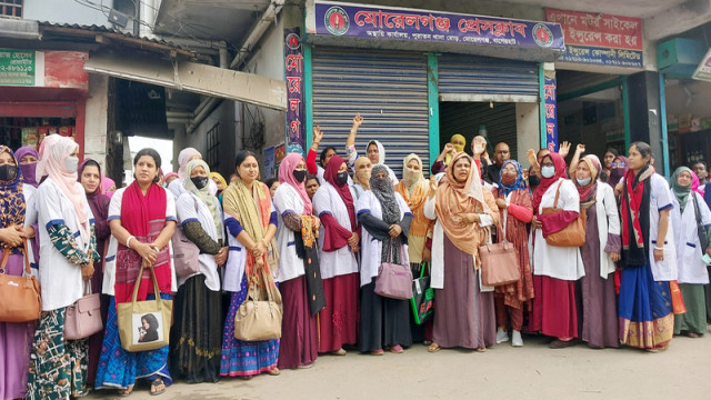 Family Planning Department officials in Morrelganj stage a sit-in protest demanding action over ongoing irregularities.