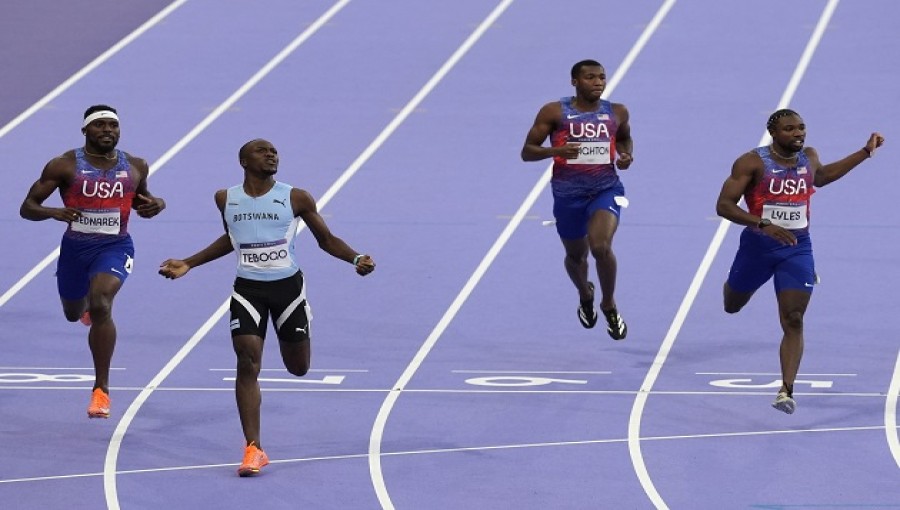 Botswana's Tebogo Surges Ahead of American Runners to Claim Historic Olympic Gold in 200m