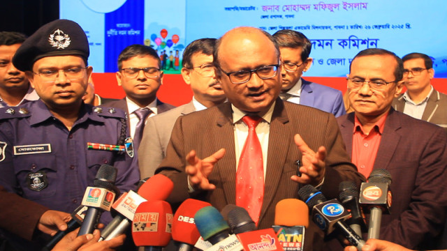 "ACC Chairman Dr. Abdul Momen addresses the media after a public hearing in Pabna, emphasizing the need for the commission's constitutional status to enhance its independence."