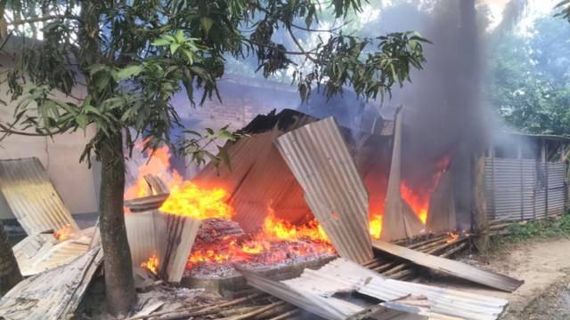 Violence escalates in Pabna Bera upazila as houses are set on fire following the death of a man amid a dispute over mosque construction.