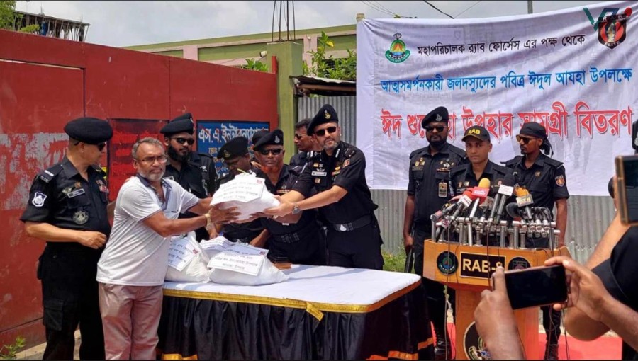 Lt. Col. Quazi Zubair Alam Shovan of RAB-8 distributes Eid gifts to surrendered pirates at various locations in the Khulna and Satkhira districts on June 12, 2024. Photo: Voice7 News