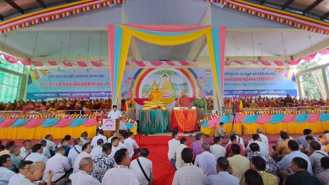 Devotees gather at Rajban Vihara in Rangamati on August 30 during the Maha Sanghadana ceremony, offering prayers for peace and national well-being.