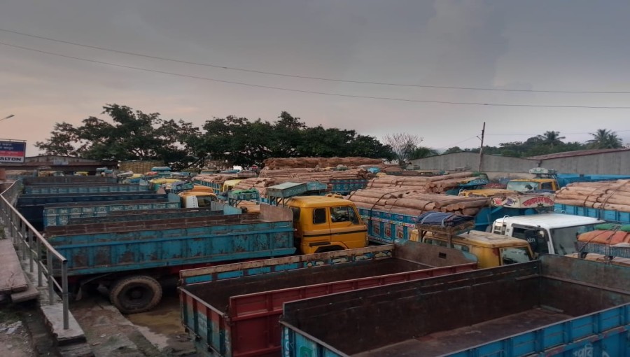 "Illegal double-chassis trucks dominate Rangamati roads, leading to significant government revenue losses and increased accident risks."