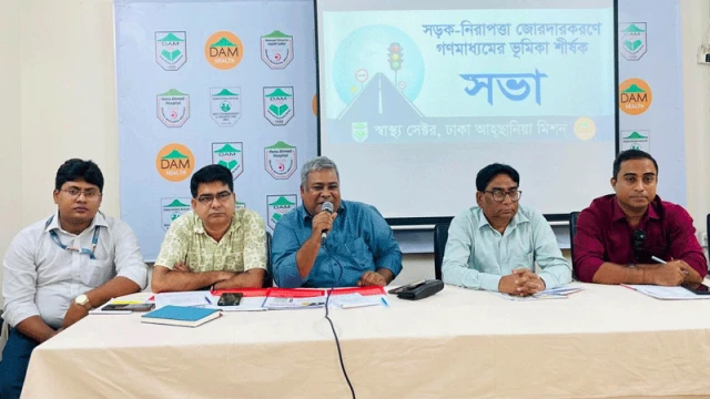 Journalist Lion Muhammad Jahangir Alam is seen delivering a speech during the “Road Safety Law: A Need for All” discussion held at Shyamoli, Dhaka.